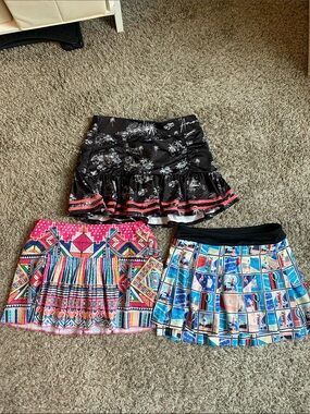 Three lucky in love tennis skirts